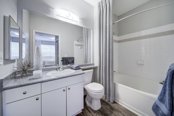 Modern bathroom with sleek fixtures at Avana on Broad Apartments, a luxury living community