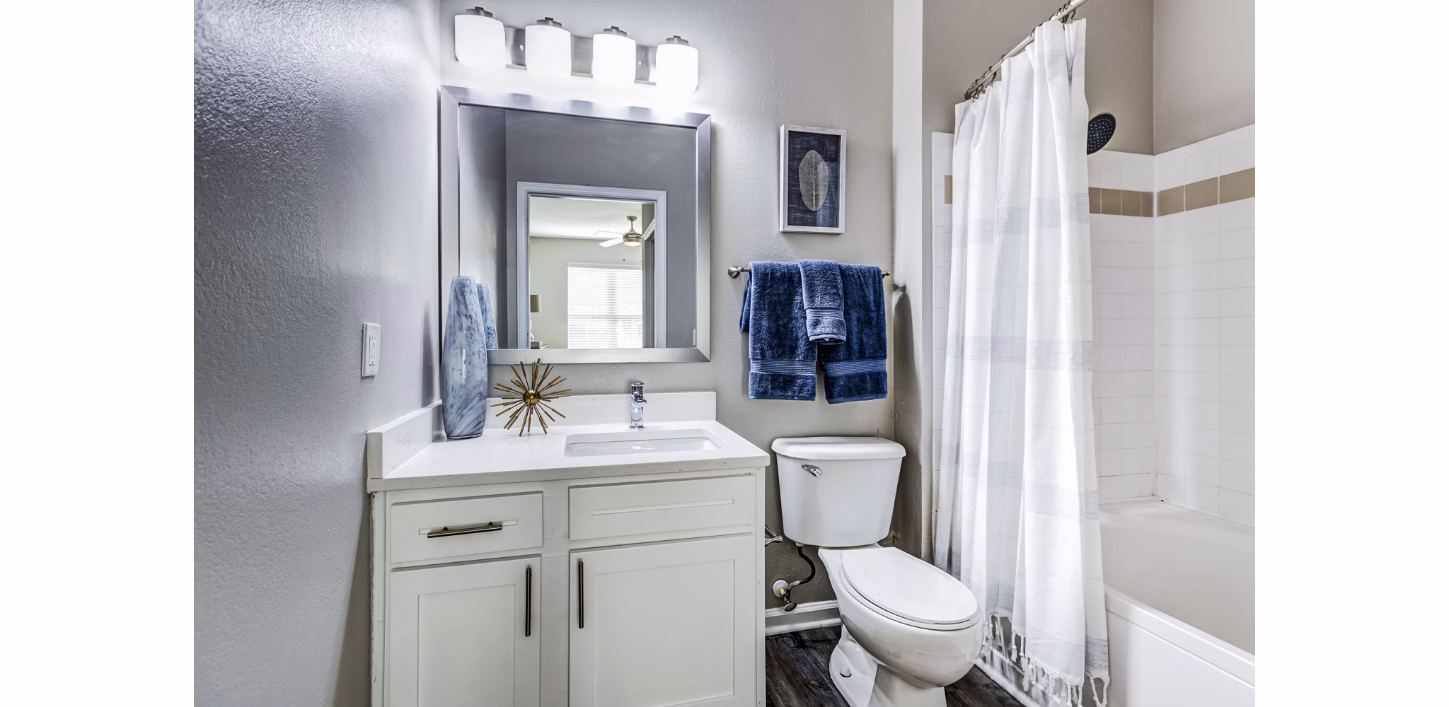 Modern bathroom featuring sleek fixtures and contemporary design in Avana on Broad Apartments