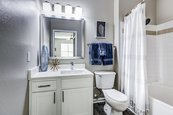 Modern bathroom featuring sleek fixtures and contemporary design in Avana on Broad Apartments