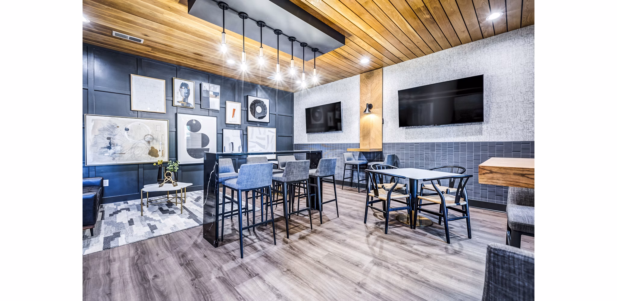 Clubhouse featuring modern lounge areas and entertainment space at Avana on Broad Apartments