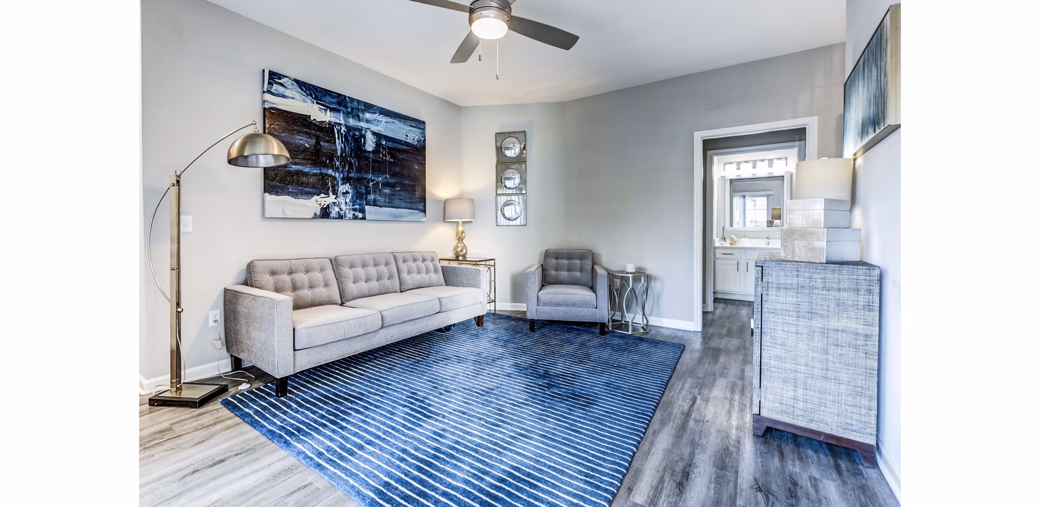 Spacious living room with modern decor at Avana on Broad Apartments