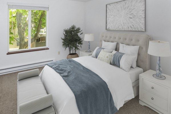 Spacious bedroom with modern decor at Veri at Timberhill Apartments