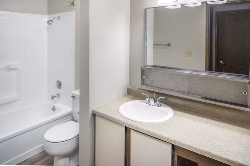 Luxurious bathroom with sleek fixtures at Veri at Timberhill Apartments