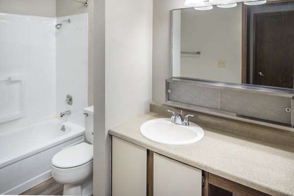 Luxurious bathroom with sleek fixtures at Veri at Timberhill Apartments