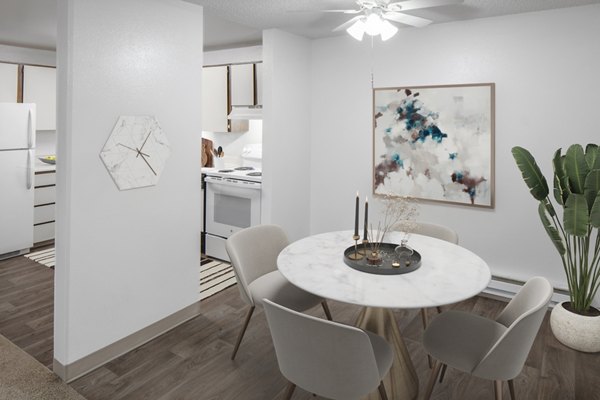Dining area with modern design elements at Veri at Timberhill Apartments