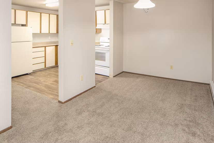 Dining area featuring modern decor and hardwood floors at Veri at Timberhill Apartments, a luxurious Greystar community in an inviting setting