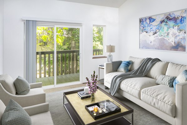 Spacious living room with modern decor at Veri at Timberhill Apartments