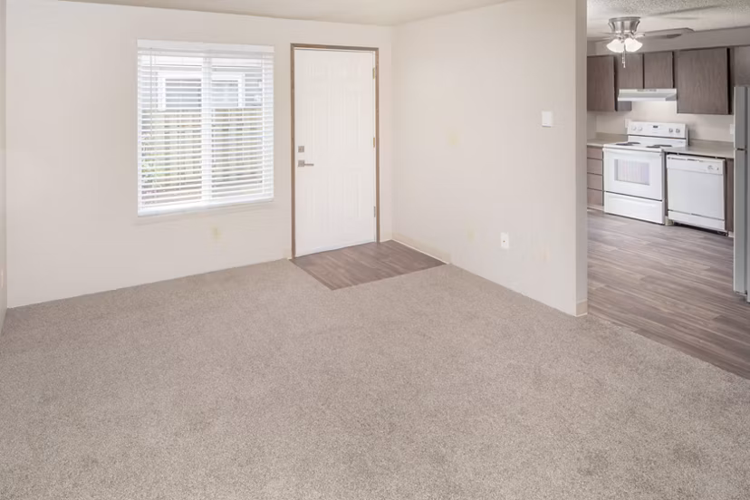 Modern living room featuring stylish decor and natural light at Veri at Timberhill Apartments, Greystar luxury apartments