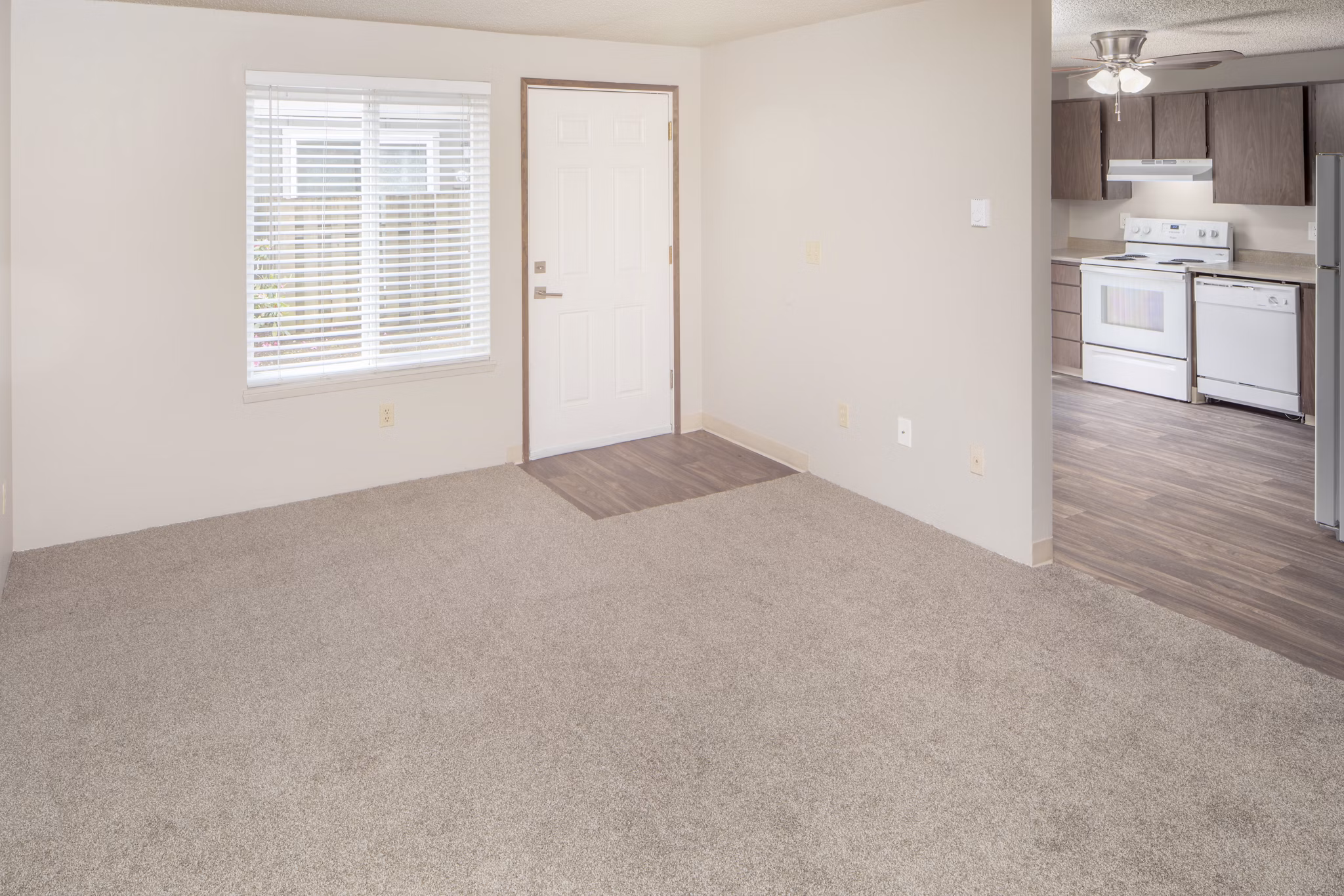 Modern living room featuring stylish decor and natural light at Veri at Timberhill Apartments, Greystar luxury apartments