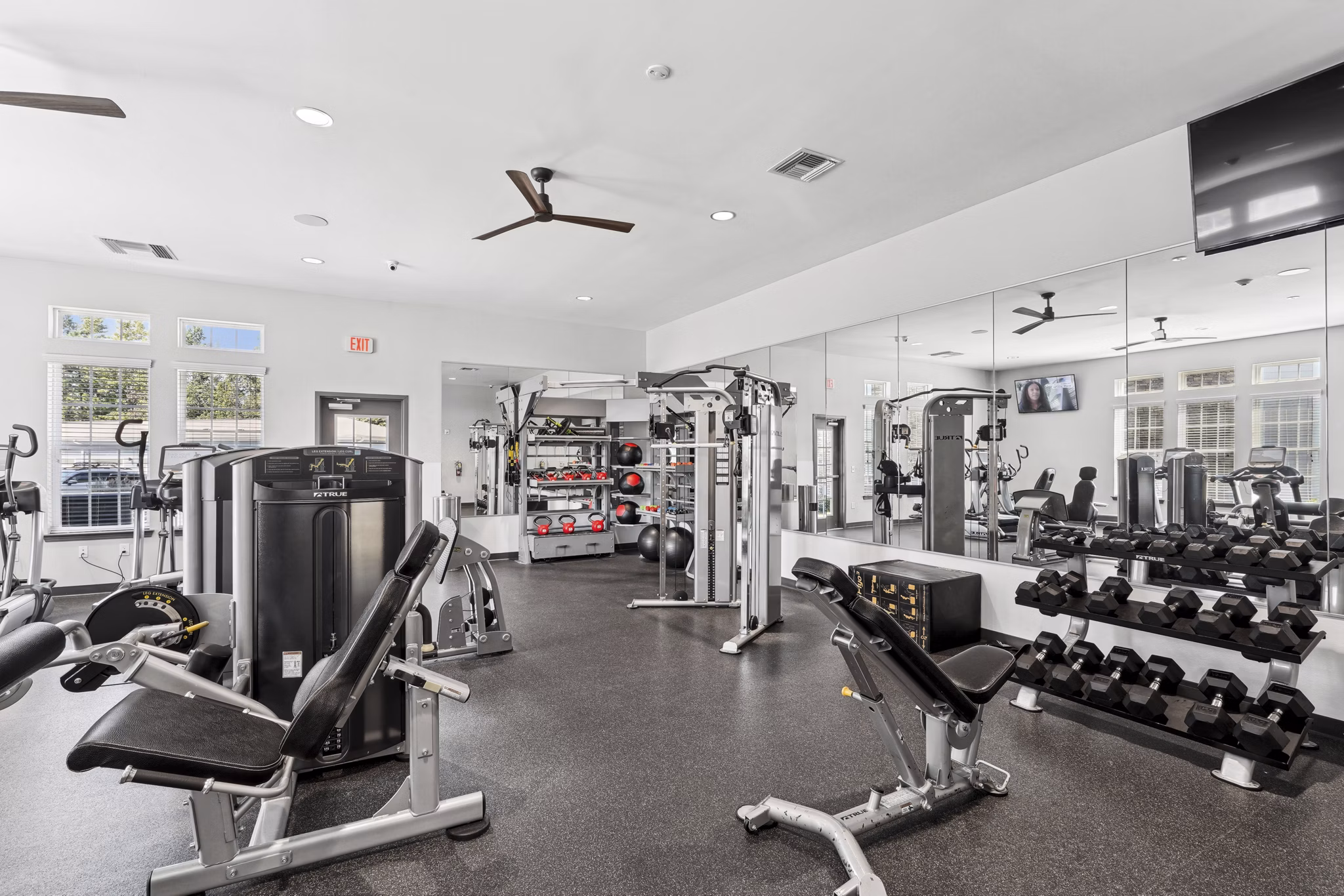 fitness center at Parkstone at Knightdale Apartments 