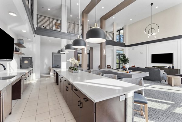 Stylish clubhouse with modern furnishings at The Reflection at Montgomery Ridge Apartments