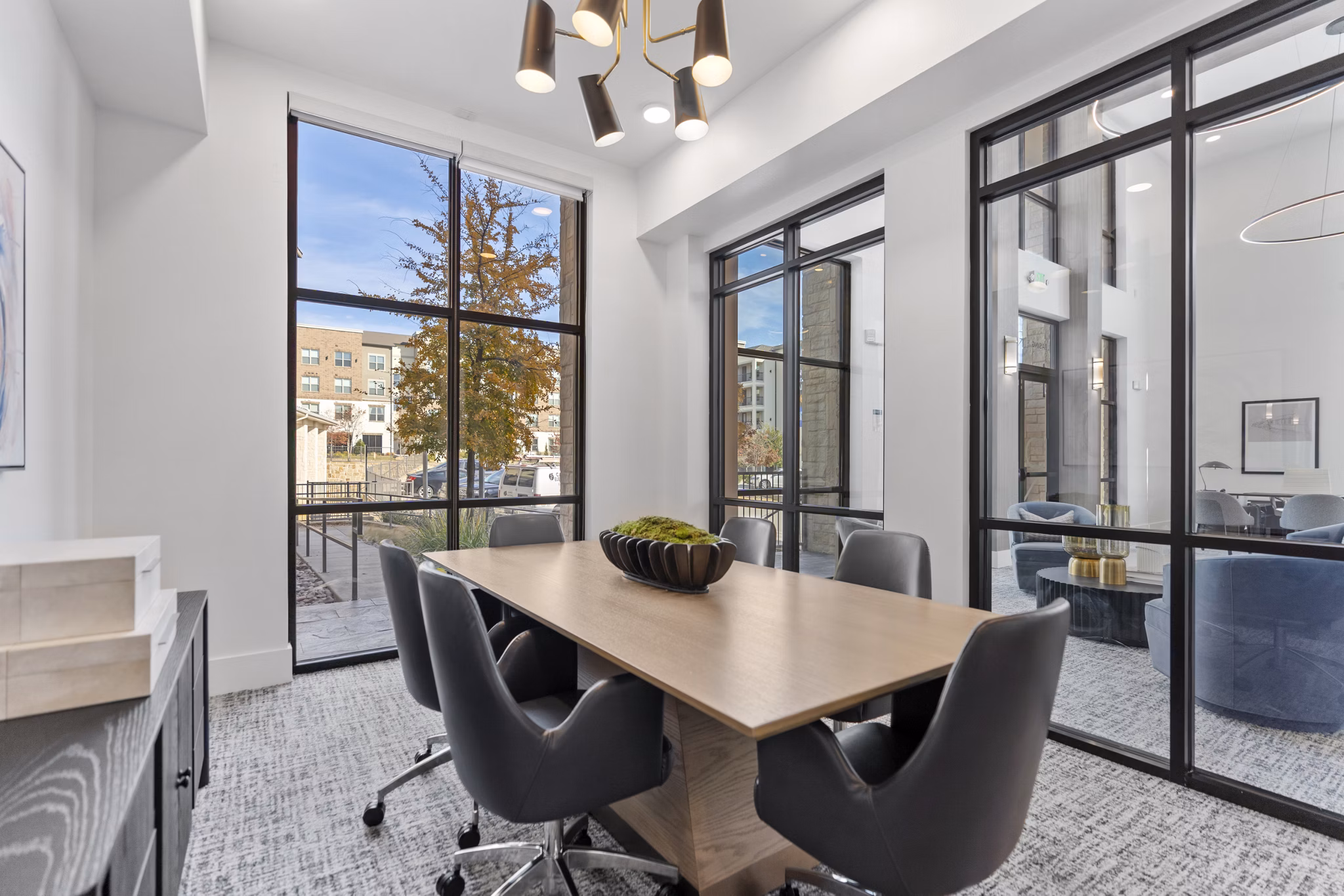 Modern meeting facility with conference seating at The Reflection at Montgomery Ridge Apartments