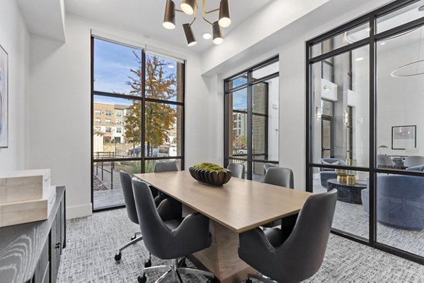 Modern meeting facility with conference seating at The Reflection at Montgomery Ridge Apartments