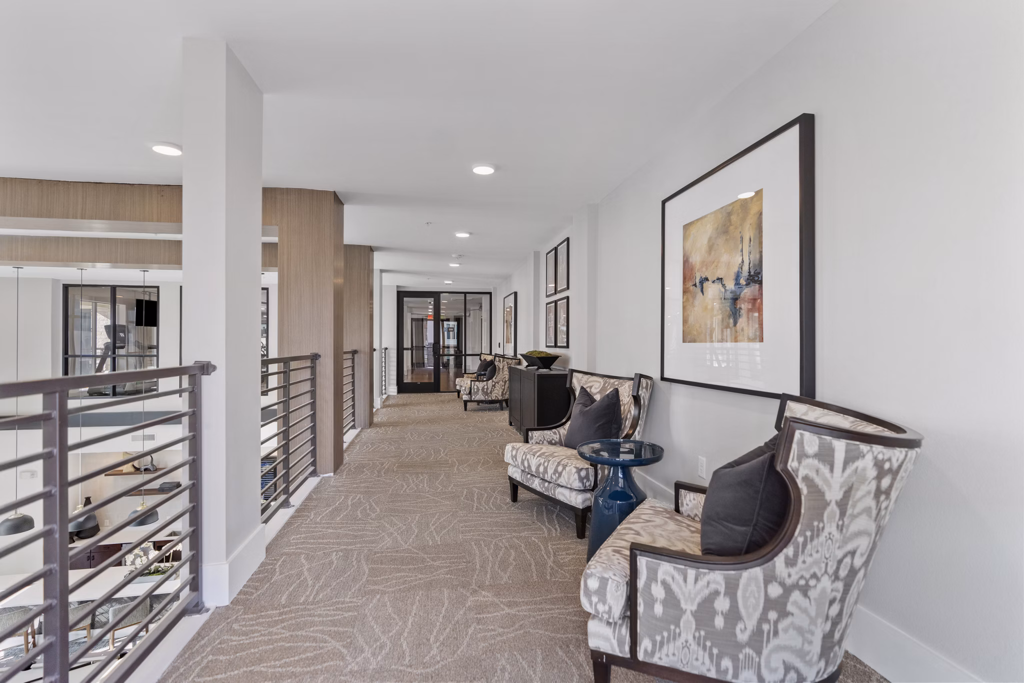 Clubhouse featuring modern design and expansive seating at The Reflection at Montgomery Ridge Apartments in Allen, Texas