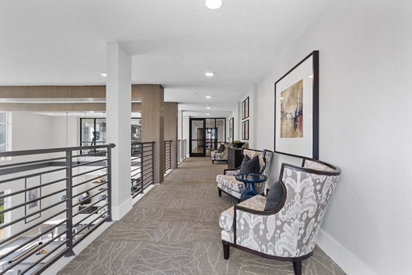 Clubhouse at The Reflection at Montgomery Ridge featuring modern design and comfortable seating Ideal space for resident gatherings and community events