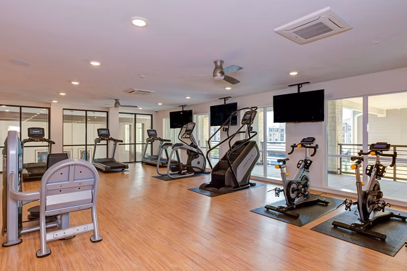 fitness center at The Reflection at Montgomery Ridge Apartments