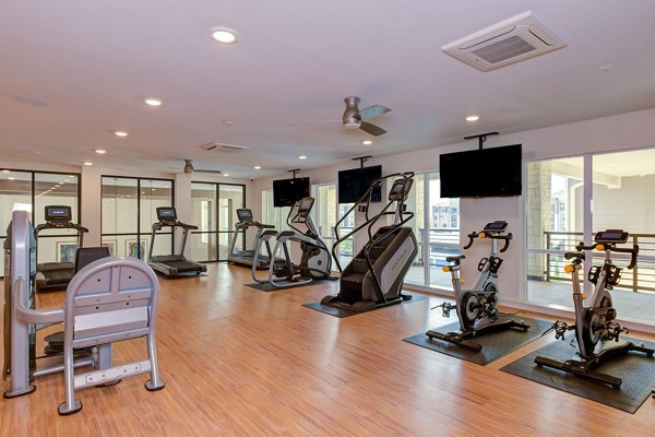 fitness center at The Reflection at Montgomery Ridge Apartments