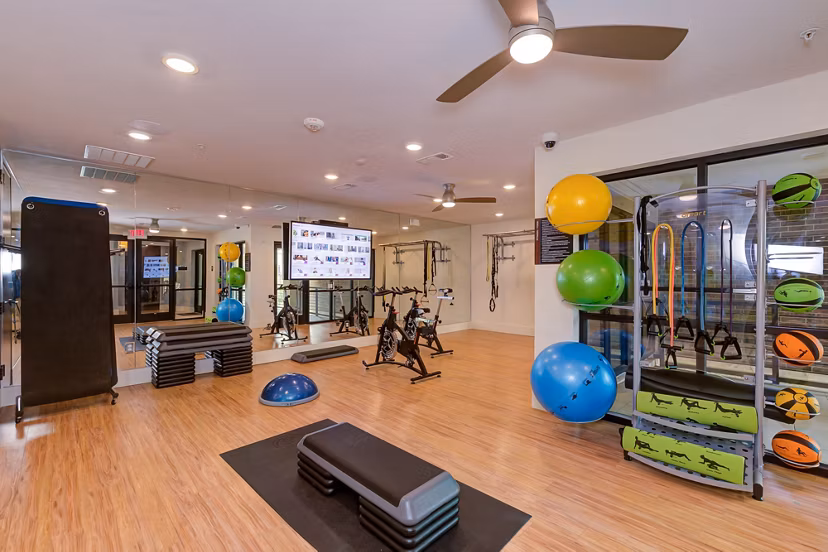 fitness center at The Reflection at Montgomery Ridge Apartments