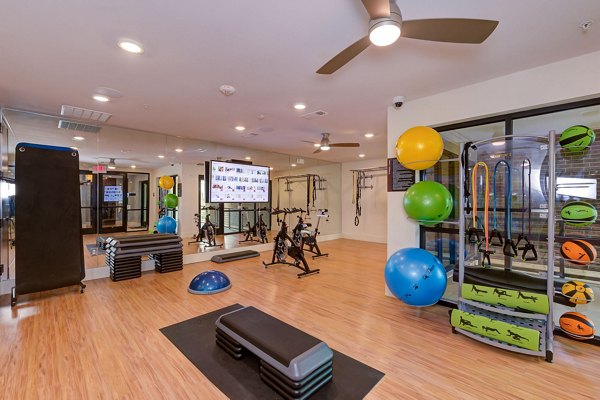 fitness center at The Reflection at Montgomery Ridge Apartments