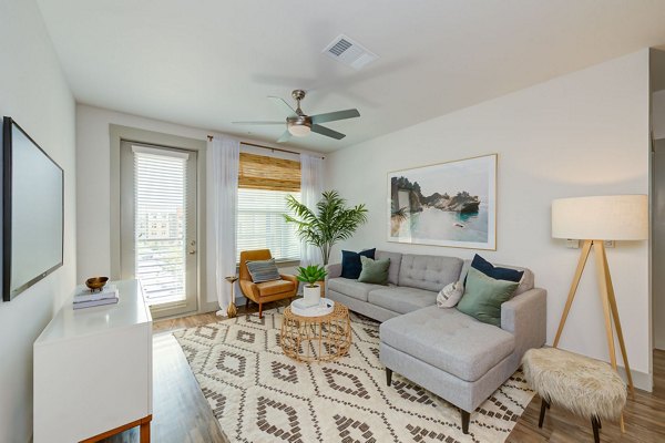 living room at The Reflection at Montgomery Ridge Apartments