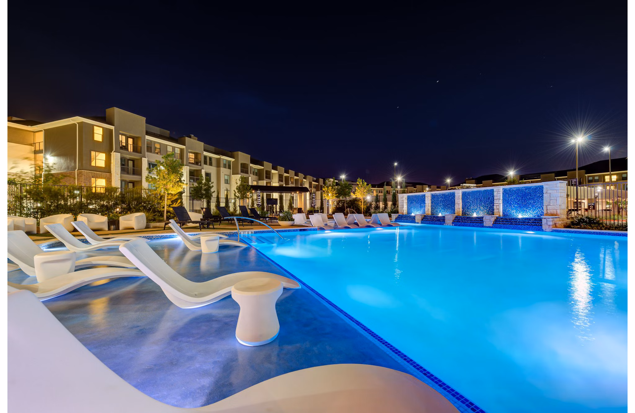 Infinity-edge pool at The Reflection at Montgomery Ridge Apartments offering luxury relaxation and stunning views