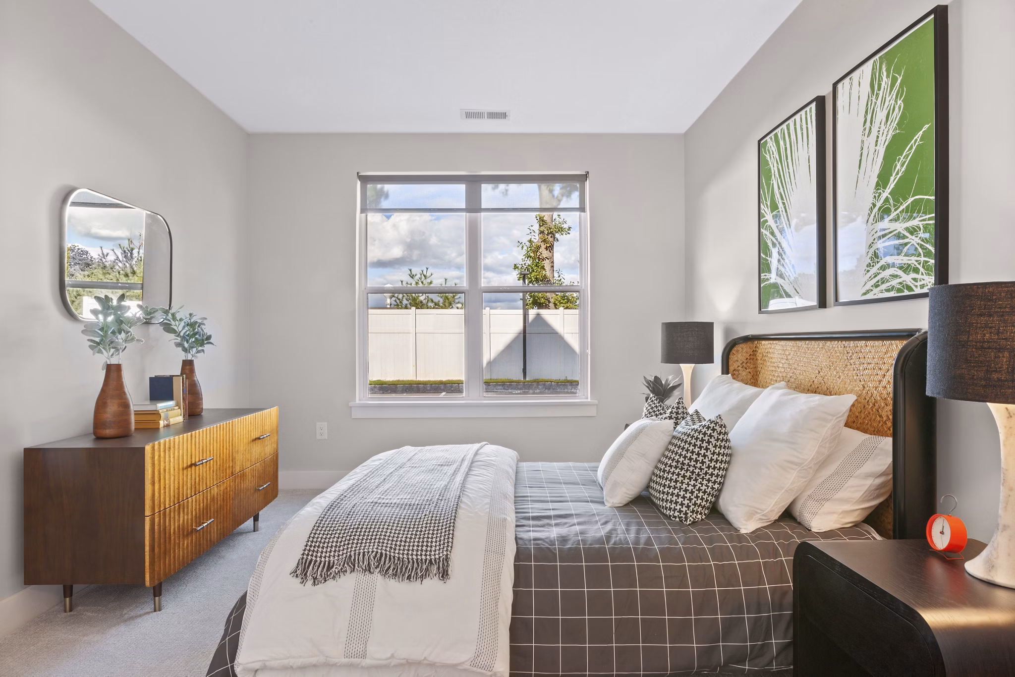 Spacious bedroom with modern furnishings at Canter Green Apartments