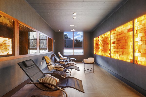 Clubhouse featuring modern interiors at Canter Green Apartments, luxury living by Greystar in an elegant community setting