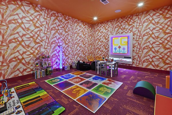 Elegant clubhouse with modern furnishings at Canter Green Apartments, perfect for social gatherings and community events
