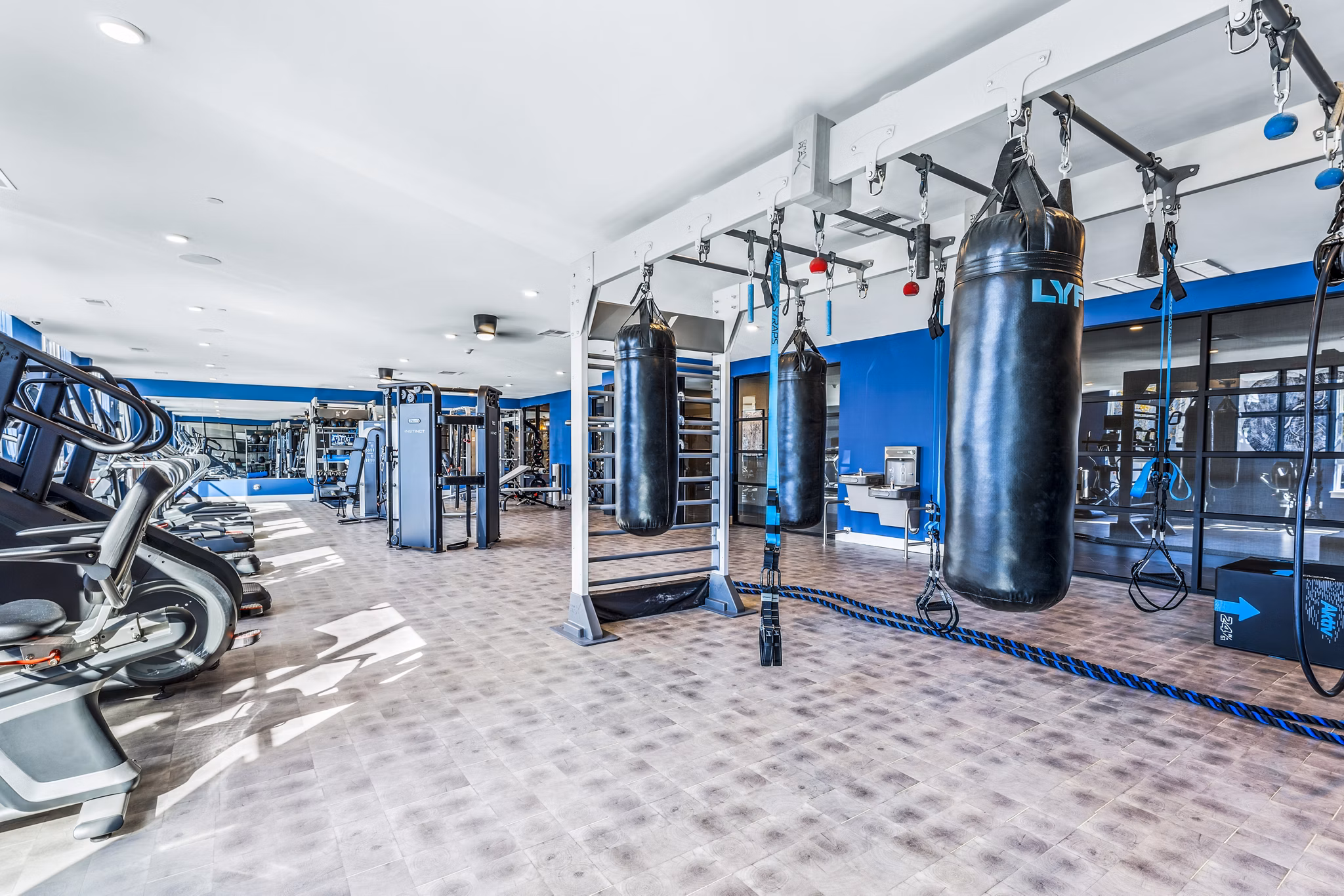 State-of-the-art yoga/spin studio at Canter Green Apartments with sleek designs and ample space for Greystar's health enthusiasts