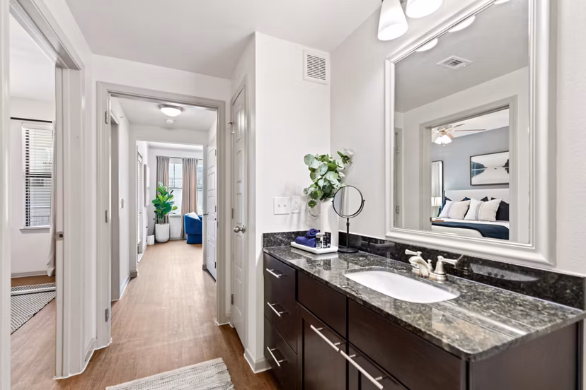 Modern bathroom with chic fixtures in Creekside Townhomes Apartments