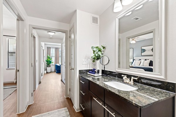 Modern bathroom with chic fixtures in Creekside Townhomes Apartments
