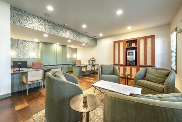 Clubhouse with modern furnishings at Creekside Townhomes Apartments, perfect for social gatherings and community events