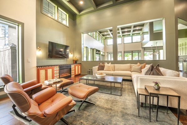 Clubhouse at Creekside Townhomes offers modern amenities and cozy seating areas, ideal for community gatherings and leisure activities