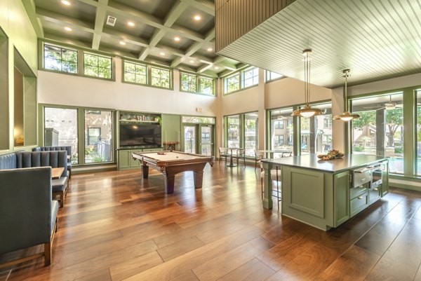 Spacious clubhouse with modern amenities at Creekside Townhomes Apartments, ideal for community gatherings and events