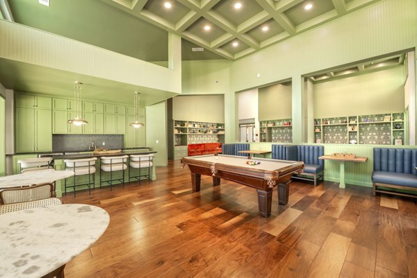 Stylish clubhouse with modern furnishings at Creekside Townhomes Apartments, ideal for social gatherings and community events