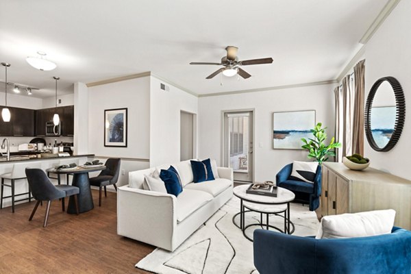 Cozy living room with stylish decor in Creekside Townhomes Apartments