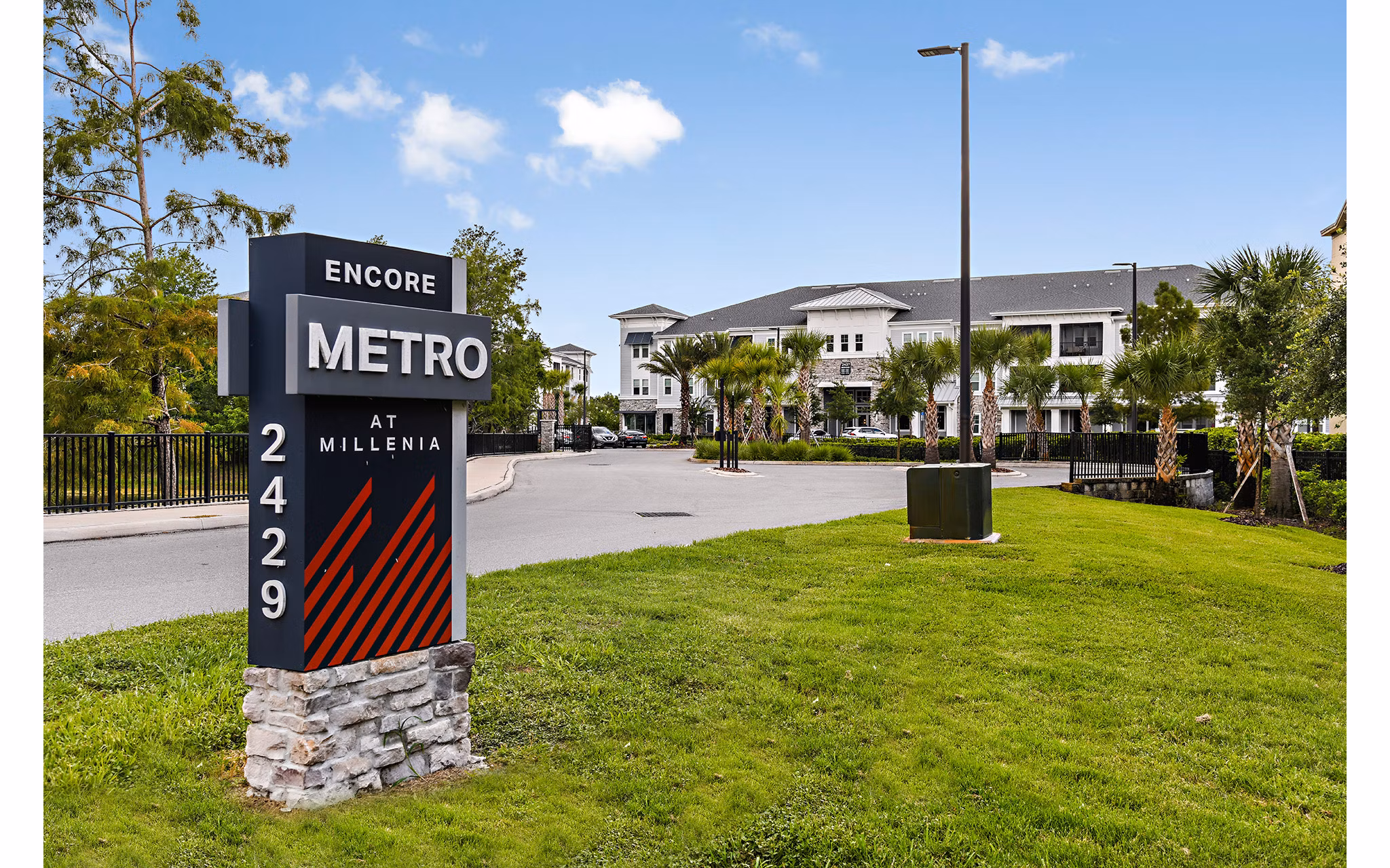 Encore Metro at Millenia: Elegant building signage at Millenia Apartments