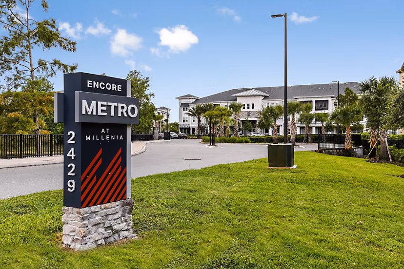 Encore Metro at Millenia: Elegant building signage at Millenia Apartments