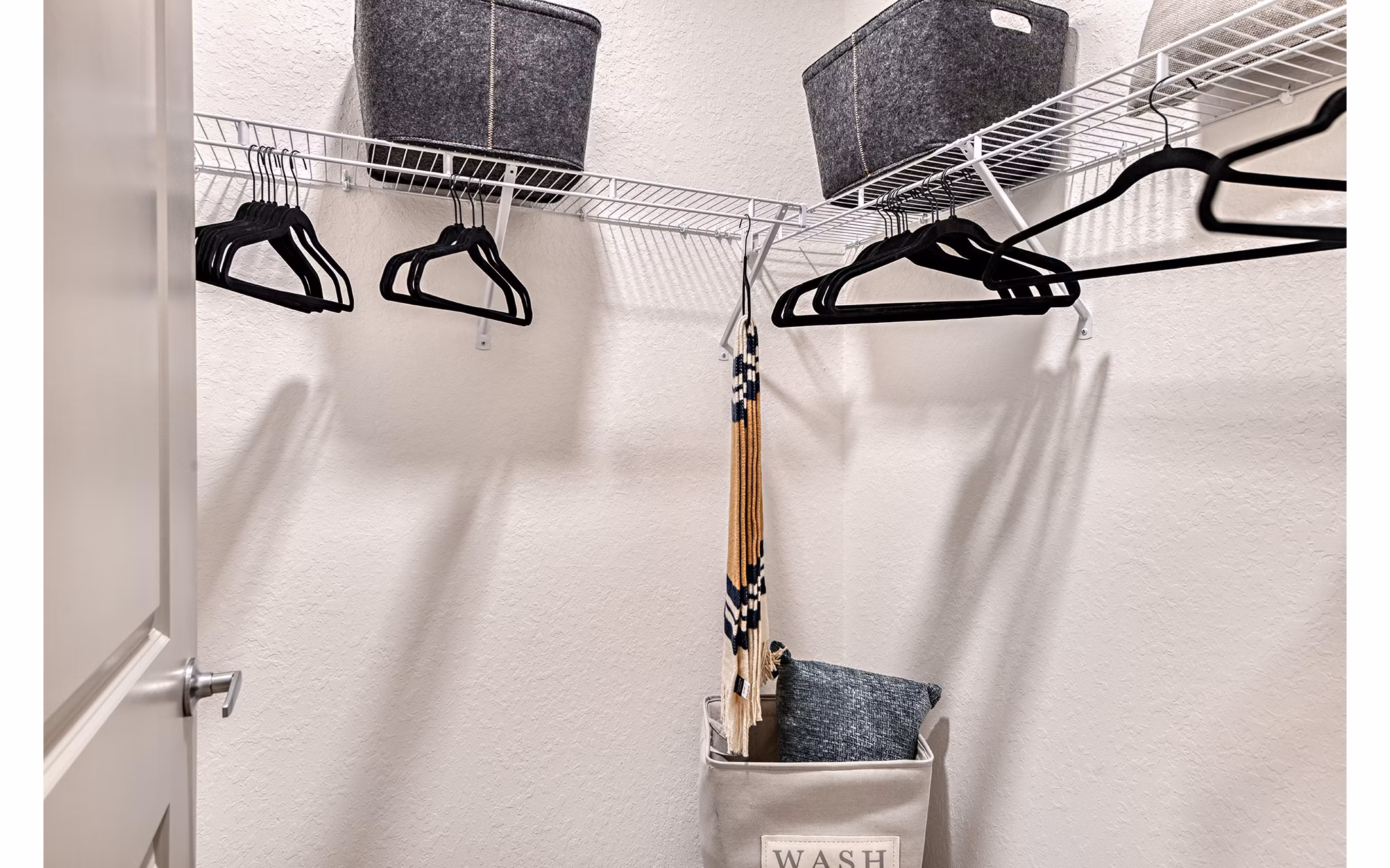 Spacious bedroom closet with sliding doors in Encore Metro at Millenia Apartments, Orlando luxury apartment living