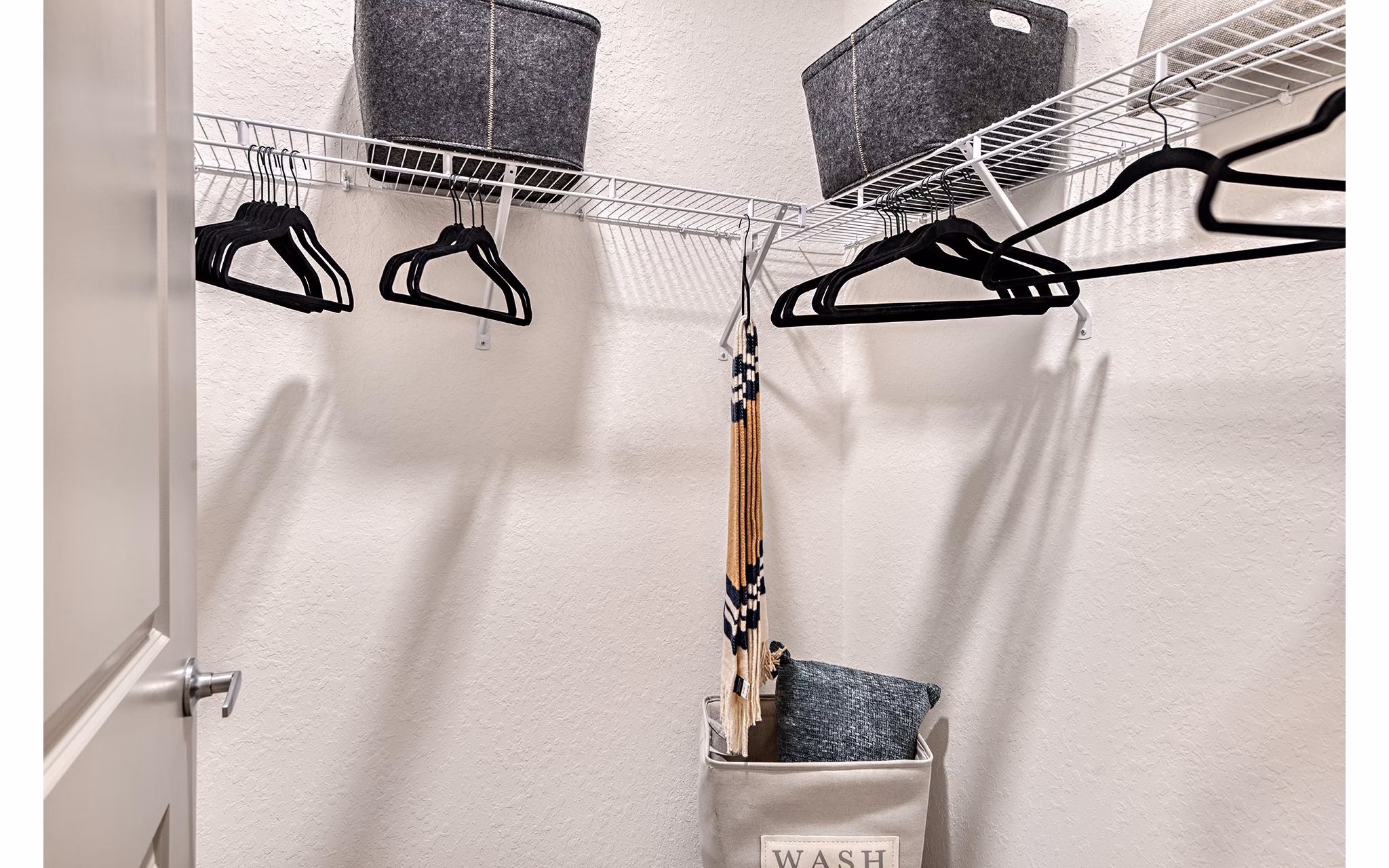 Spacious bedroom closet with sliding doors in Encore Metro at Millenia Apartments, Orlando luxury apartment living
