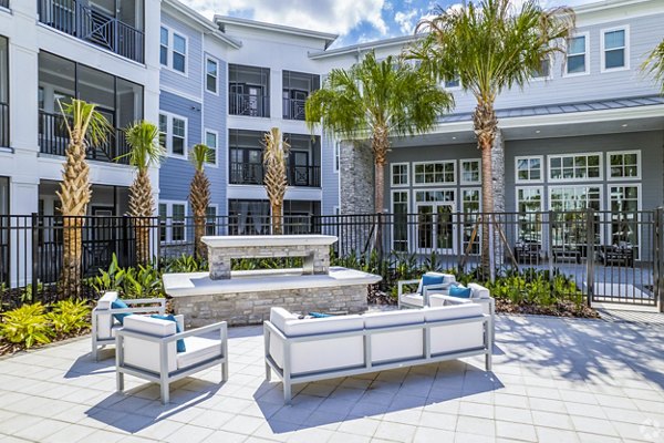 fire pit/patio at Encore Metro at Millenia Apartments