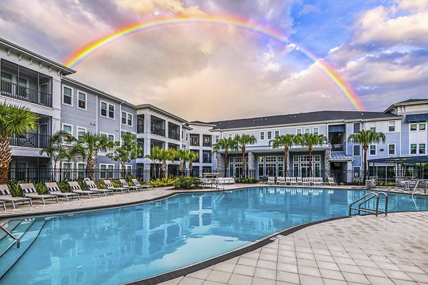 Resort-style pool at Encore Metro at Millenia Apartments offering luxury relaxation
