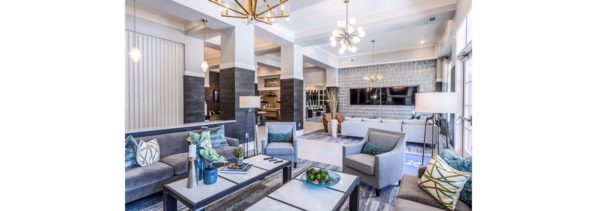 Modern clubhouse with elegant seating and entertainment options at Residences at Shiloh Crossing Apartments