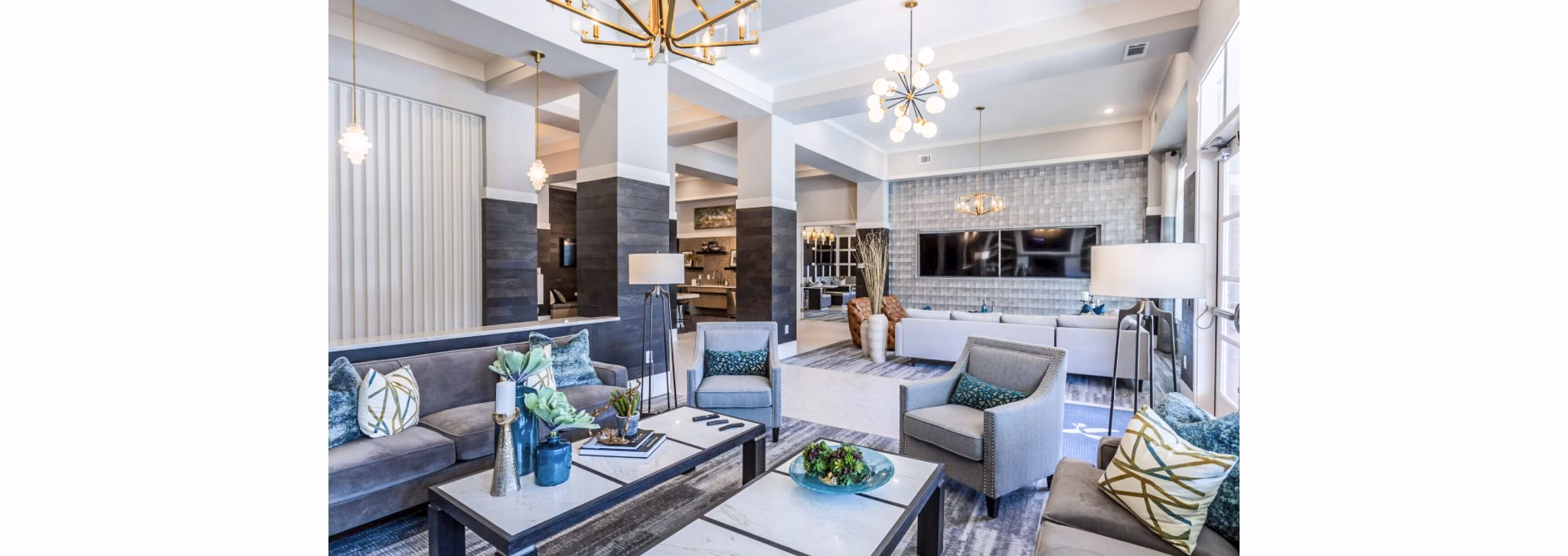Modern clubhouse with elegant seating and entertainment options at Residences at Shiloh Crossing Apartments