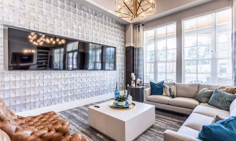 Modern clubhouse with stylish seating at Residences at Shiloh Crossing Apartments, offering luxury amenities for residents
