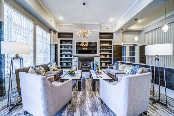 Stylish clubhouse with modern decor at Residences at Shiloh Crossing Apartments