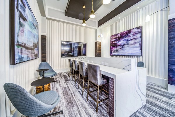 Elegant clubhouse with modern decor at Residences at Shiloh Crossing Apartments