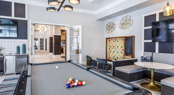 clubhouse game room at Residences at Shiloh Crossing Apartments