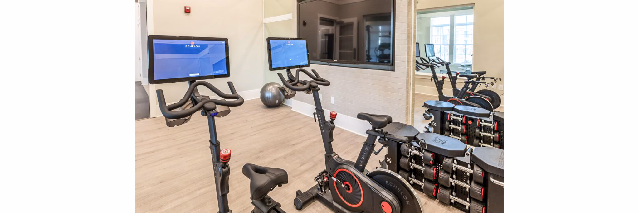 State-of-the-art fitness center with modern equipment at Residences at Shiloh Crossing Apartments