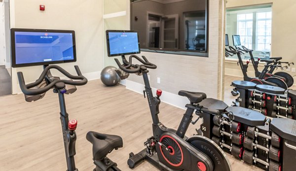 State-of-the-art fitness center with modern equipment at Residences at Shiloh Crossing Apartments